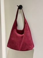 Cartera hobo ante vino