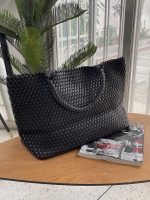 Cartera de cuero trenzado