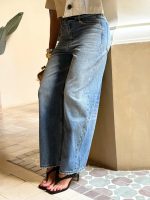 Jeans wide leg con cintura asimétrica - Imagen 3