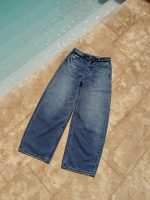 Jeans wide leg con cintura asimétrica - Imagen 6
